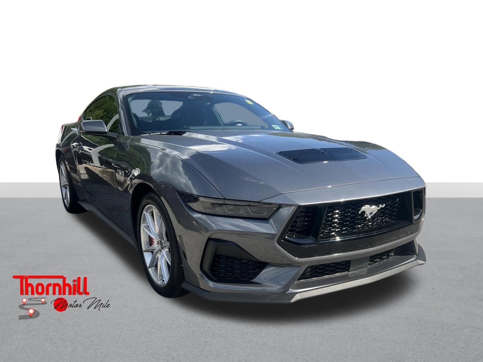 2025 Ford Mustang GT in Gray — front three-quarter view