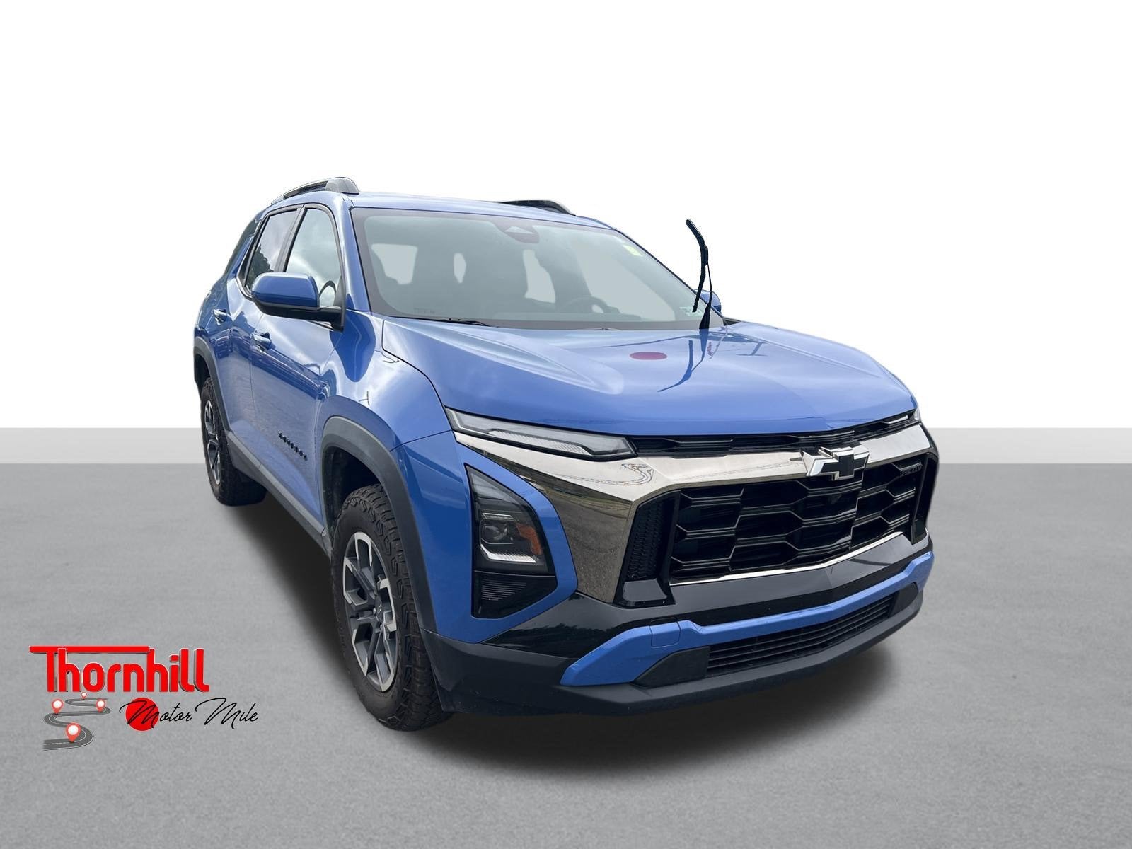 2025 Chevrolet Equinox AWD ACTIV in Reef Blue Metallic — front three-quarter view
