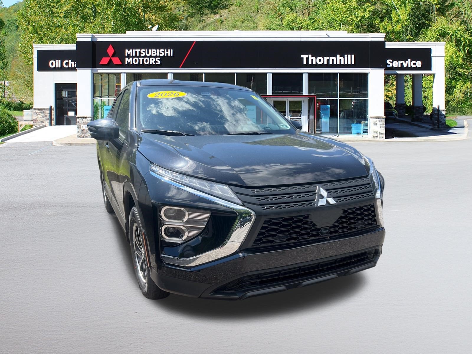2026 Mitsubishi Eclipse Cross ES in Labrador Black Pearl — front three-quarter view