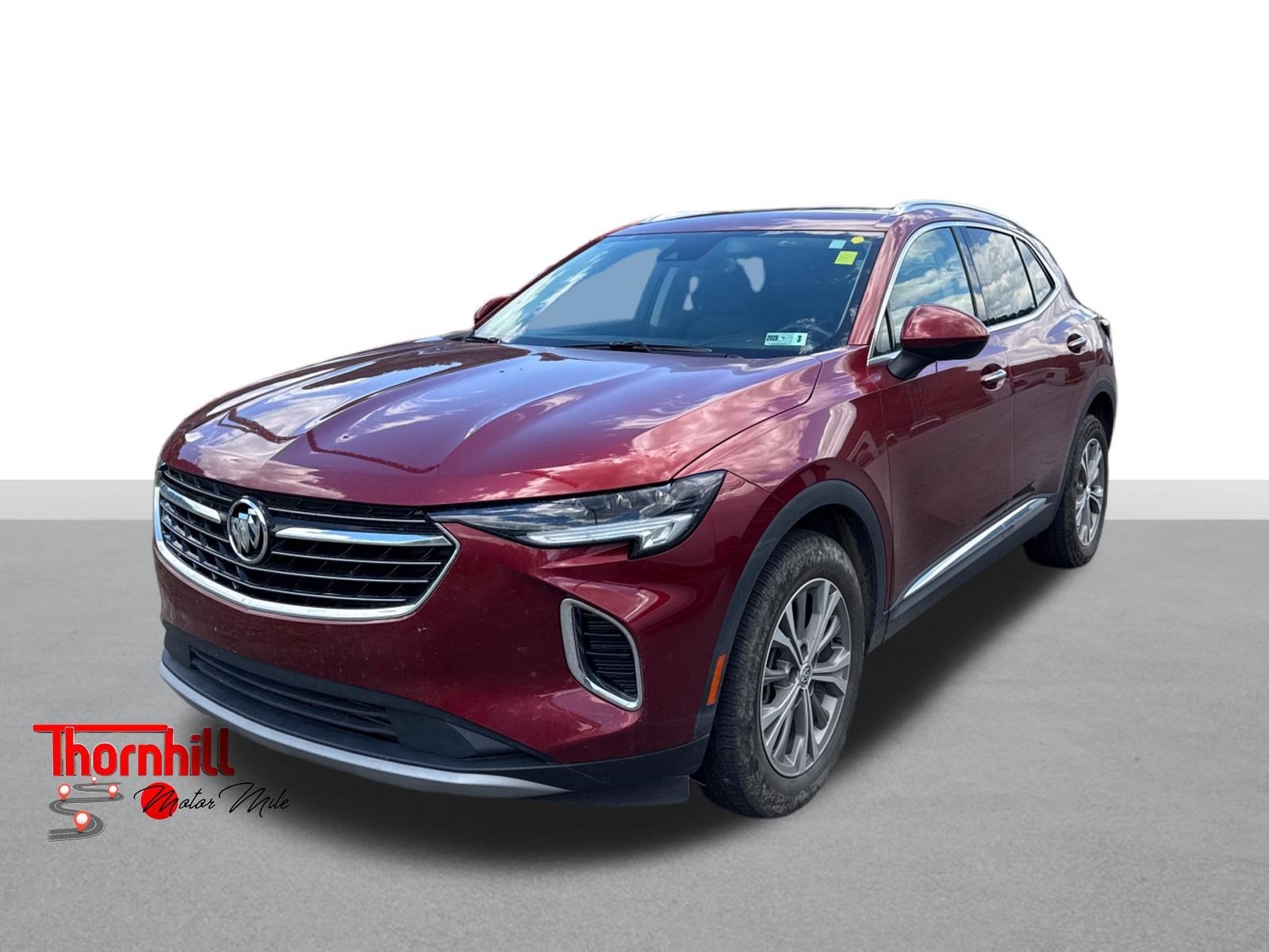 2023 Buick Envision Preferred in Cinnabar Metallic — front three-quarter view